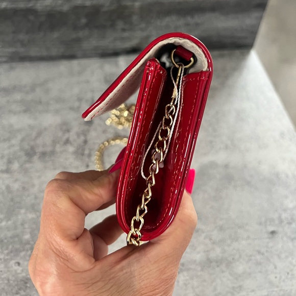 Gorgeous BCBG red patent clutch with gold strap. NWOT - Picture 4 of 5